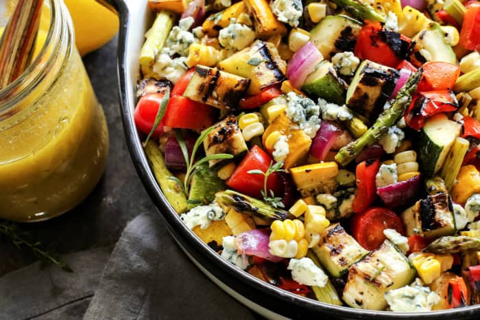 Grilled vegetable salad with blue cheese in pan