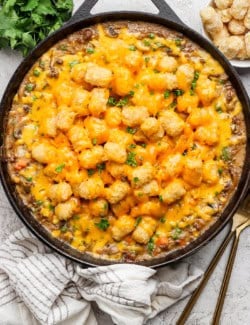 Overhead view of tater tot hotdish in skillet
