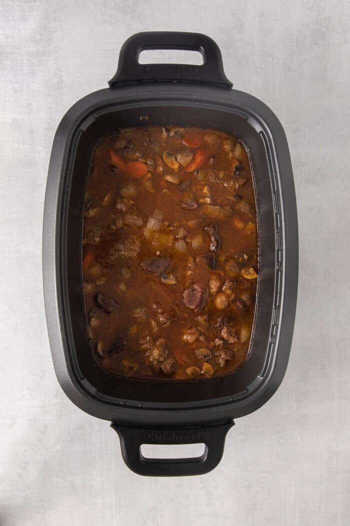 Slow Cooker Hungarian Goulash loaded with chunks of tender, melt-in-your-mouth beef and vegetables. Authentic, easy comfort food at its best! Hungarian goulash in the slow cooker