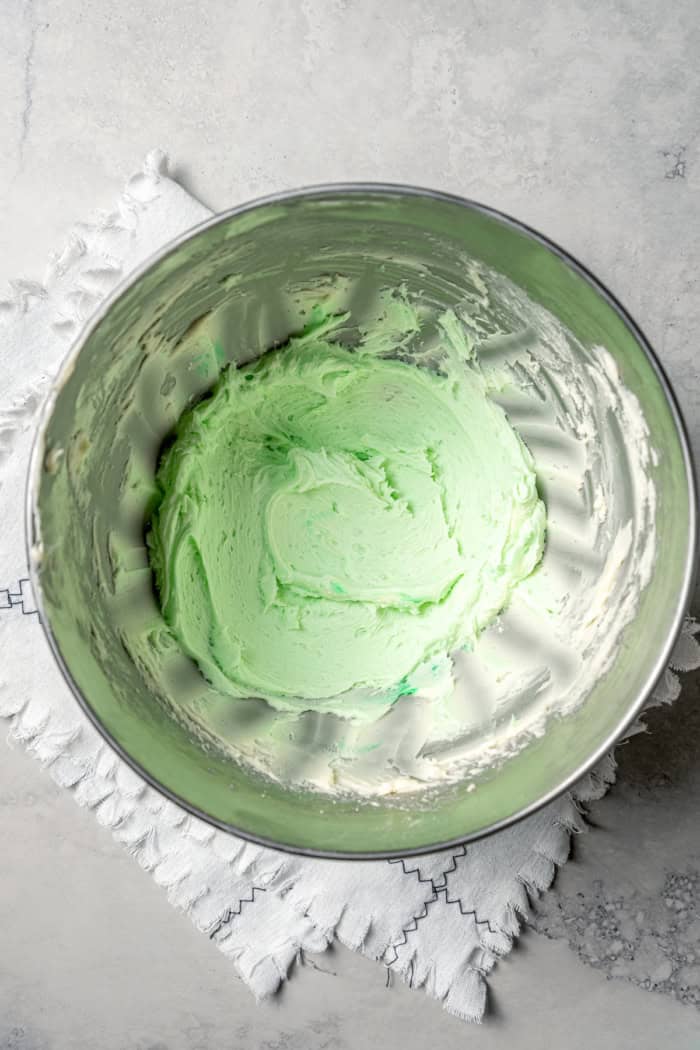Mint buttercream in mixing bowl