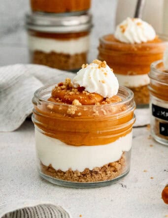 Recipe card photo for layered pumpkin pie in a jar.