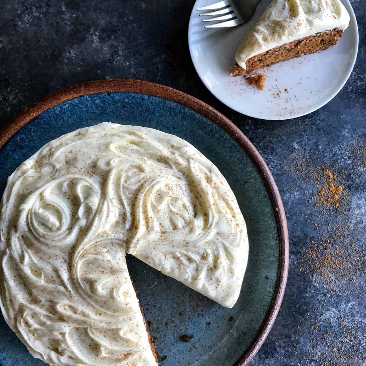 This classic carrot cake recipe is moist, perfectly spiced, and baked in a single layer, topped with creamy homemade cream cheese frosting. Carrot Cake with cream cheese frosting