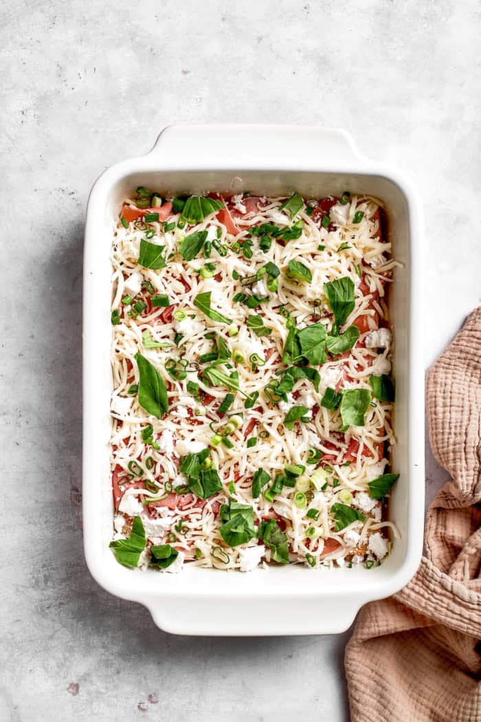 Fillings added to pan for overnight egg bake