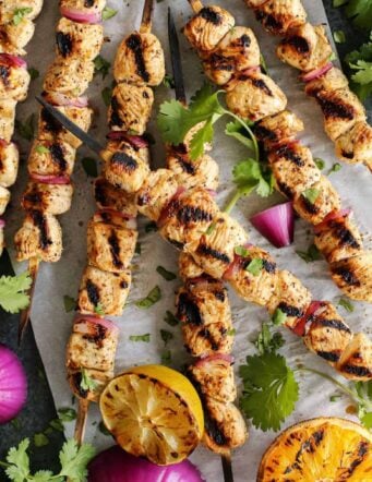 turkey skewers and grilled orange halves