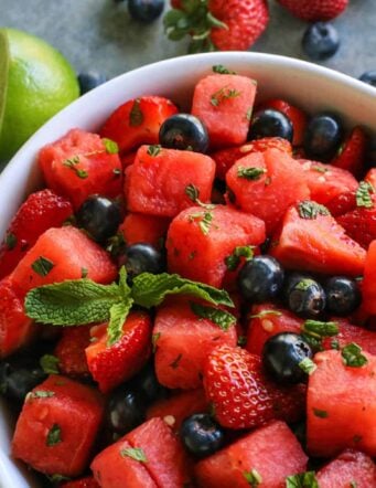 watermelon, strawberries, blueberries in a bowl