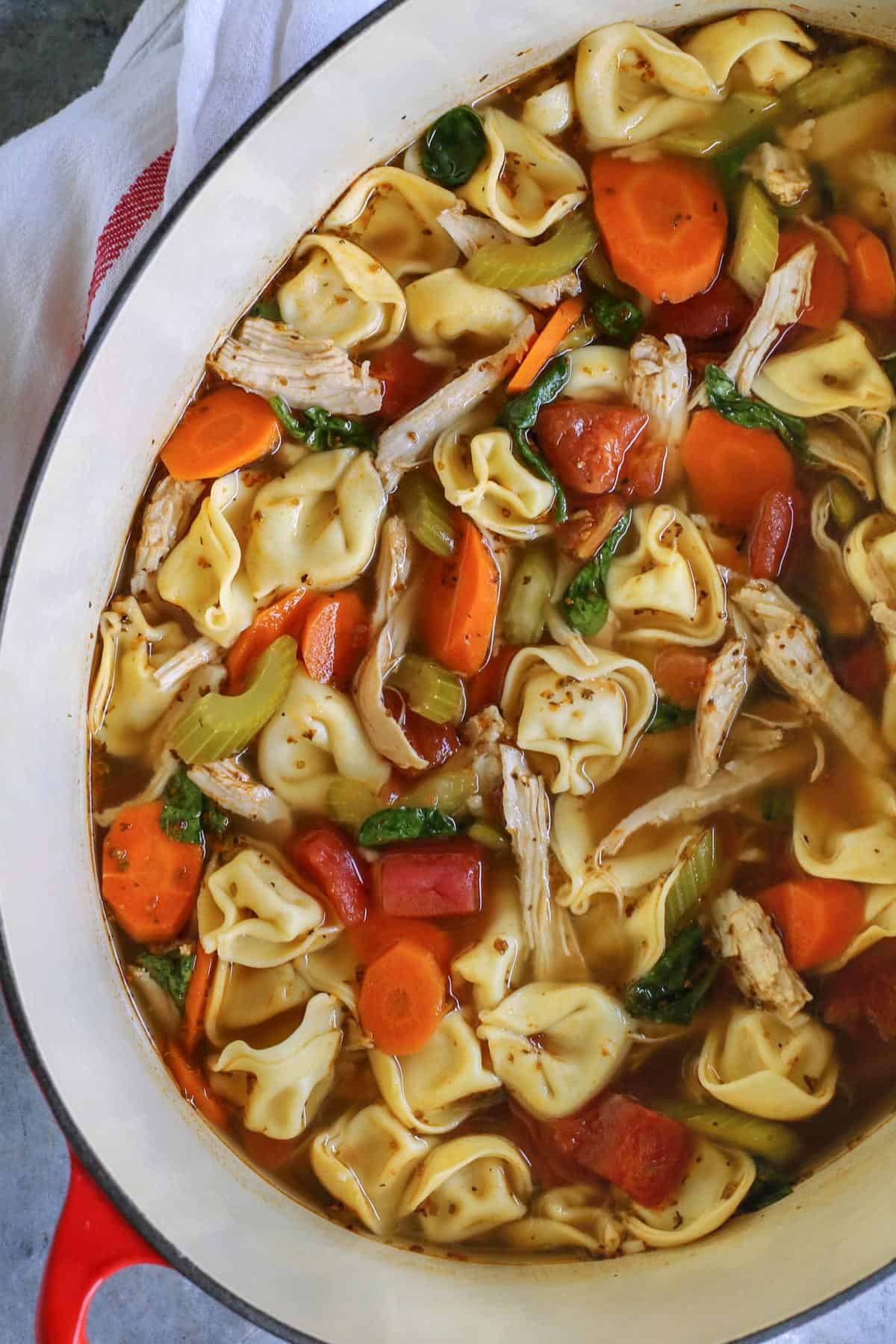 Made with leftover turkey and cheese tortellini, this Italian turkey tortellini soup is full of warm and cozy comfort. Ready in 30 minutes! big pot of turkey tortellini soup