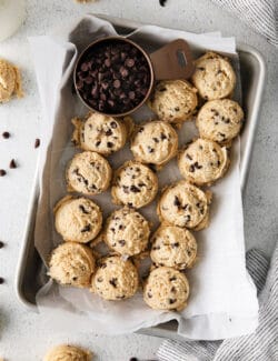 Overhead view of scoops of edible chocolate chip cookie dough on a tray