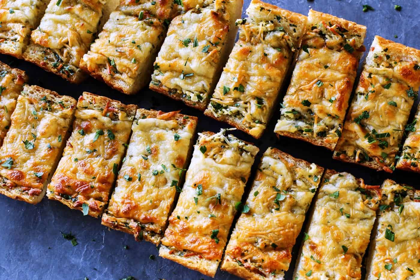 Cheesy garlic bread is the best, with buttery, toasted bread that's soft inside, crispy outside, and loaded with fresh herbs and melty cheese. garlic bread with cheese