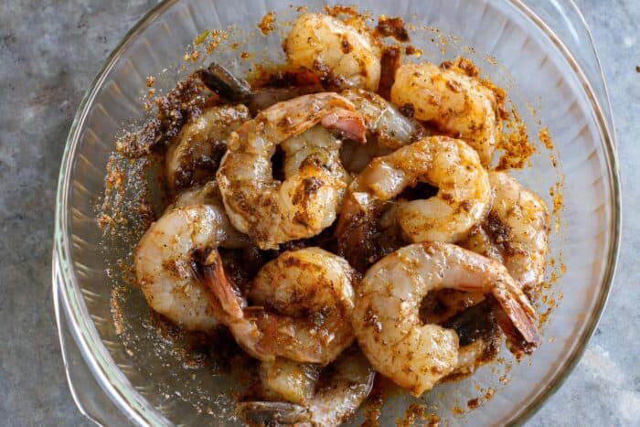 shrimp with marinade in a glass bowl