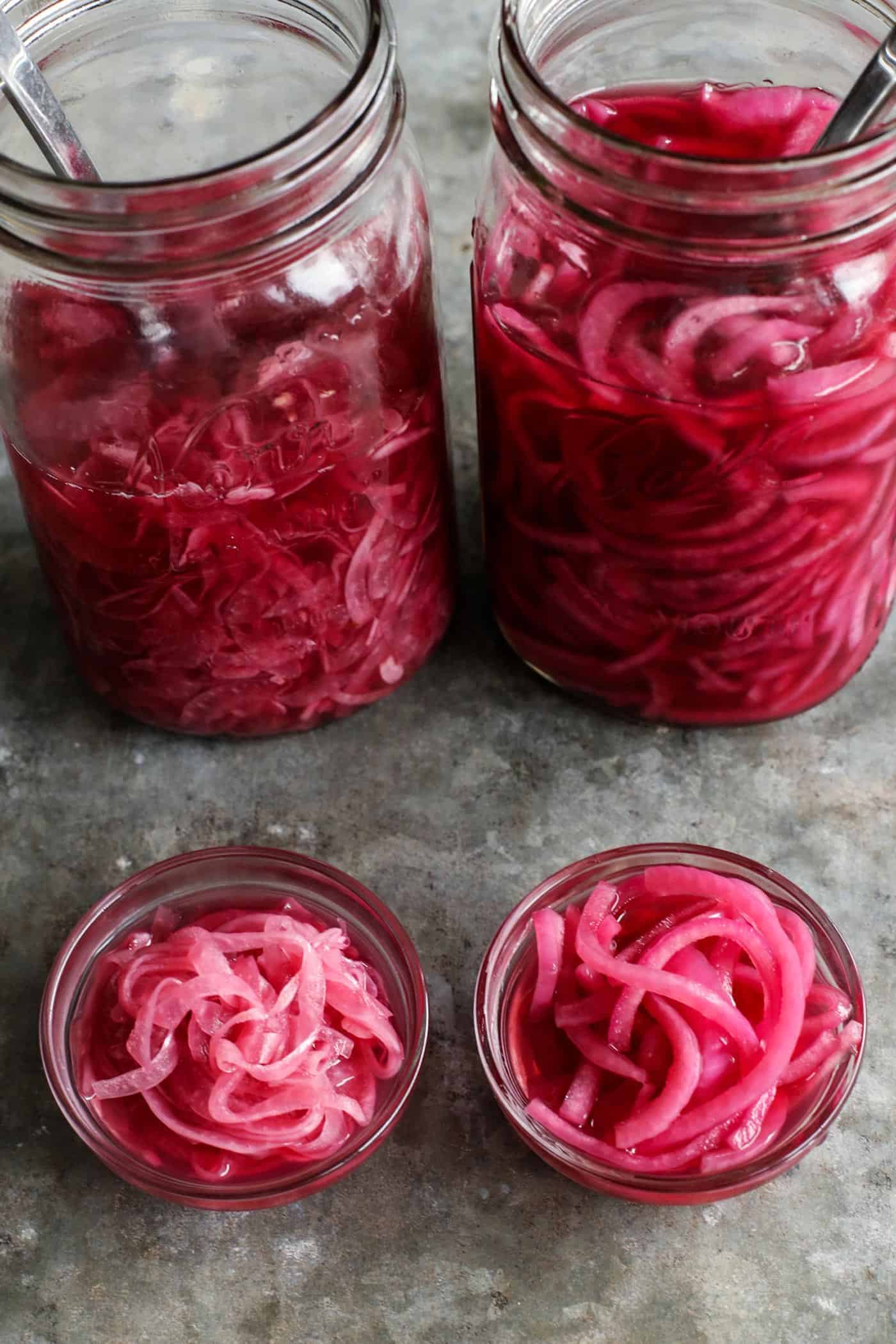 This quick pickled red onions recipe is so good! This is the easiest and most flavorful way to make pickled red onions in the fridge. two jars of pickled red onions, 1 jar is thin-cut and the other jar is thick-cut