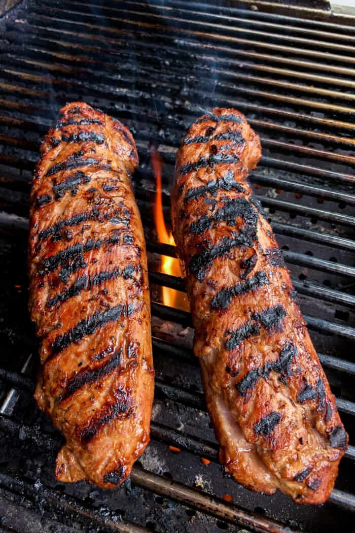 Teriyaki Pork Tenderloin bathes tender pork in a homemade marinade, grills it to perfection, and tops it with juicy fresh pineapple salsa. pork tenderloin on a grill