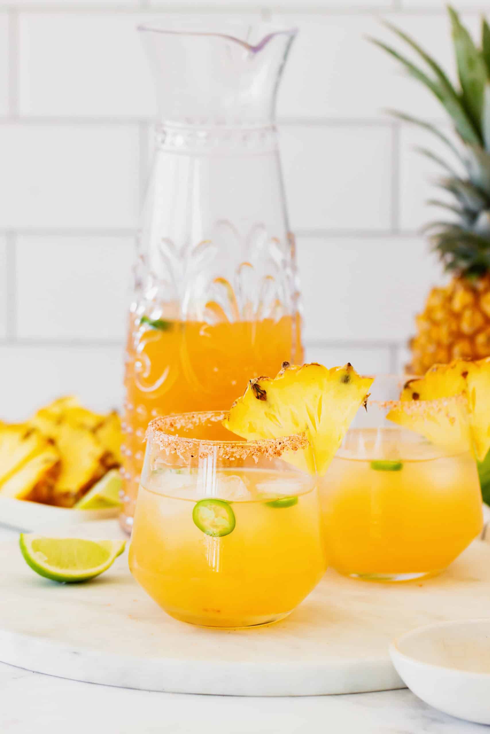 This spicy pineapple jalapeño margarita is a delicious twist on the classic cocktail with blanco tequila, fresh pineapple juice, and jalapeño. margaritas made with pineapple and jalapeno