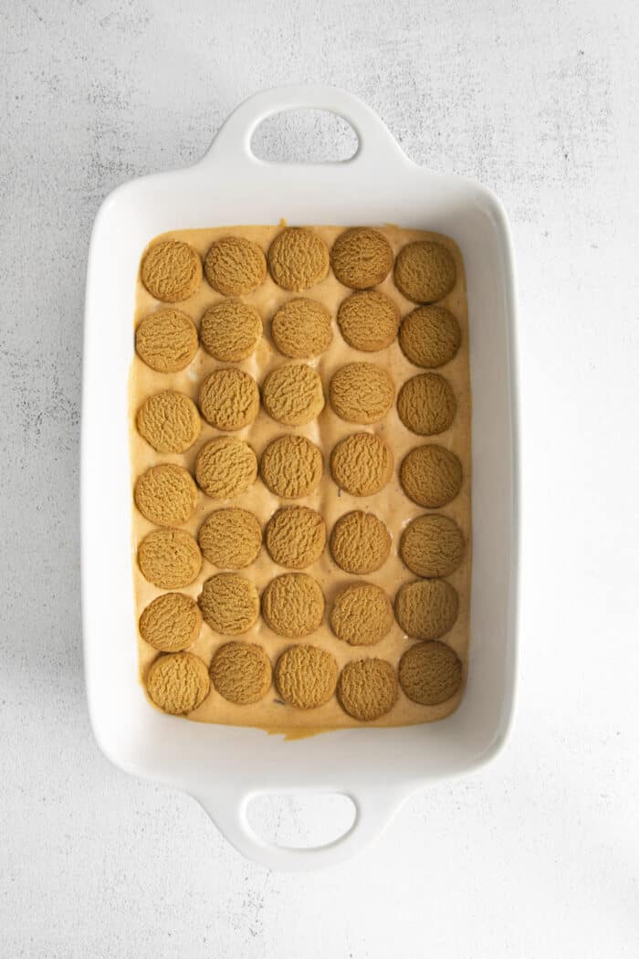 Overhead shot of Pumpkin Icebox Cake being assembled
