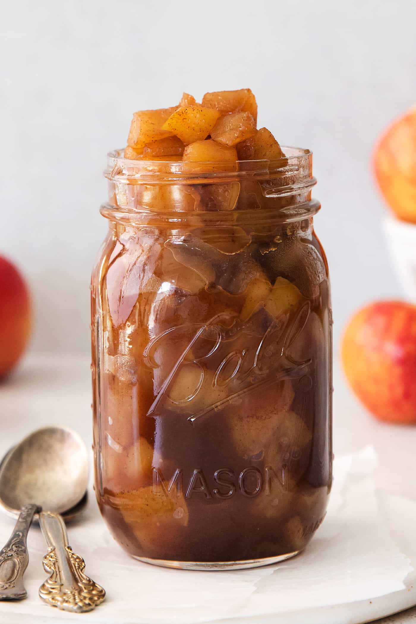 This easy homemade applesauce recipe can be made smooth or chunky, with simple refrigerator storage or canning for long-term pantry storage! jar of easy applesauce recipe
