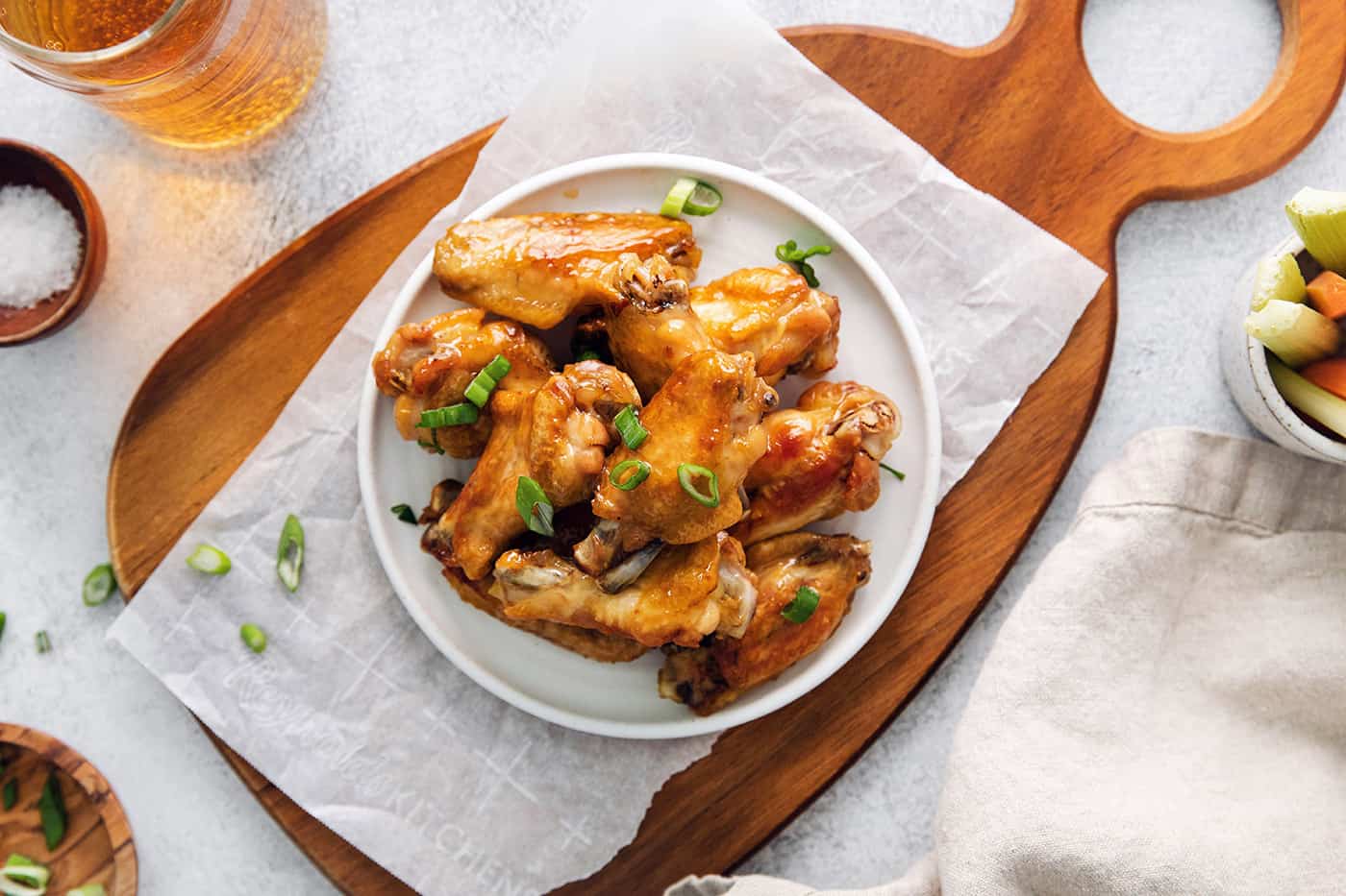 A plate of crispy hot honey chicken wings