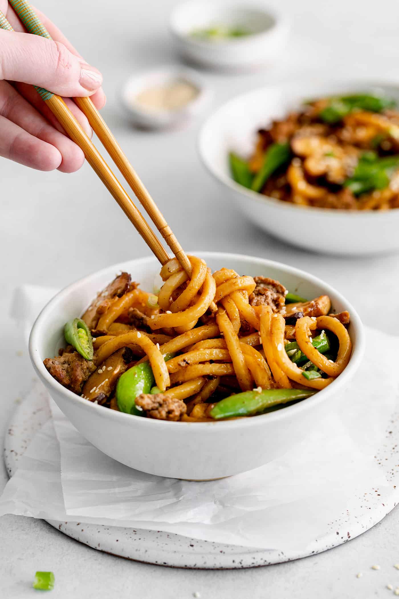 Chopsticks in a bowl of yaki udon