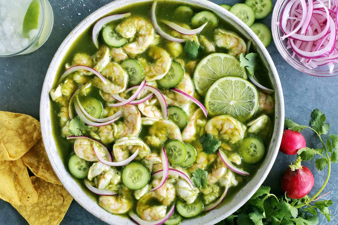 With just the right amount of heat, this Easy Shrimp Aguachile features shrimp marinated in lime juice and then tossed in a spicy marinade. Overhead view of a bowl of shrimp aguachile
