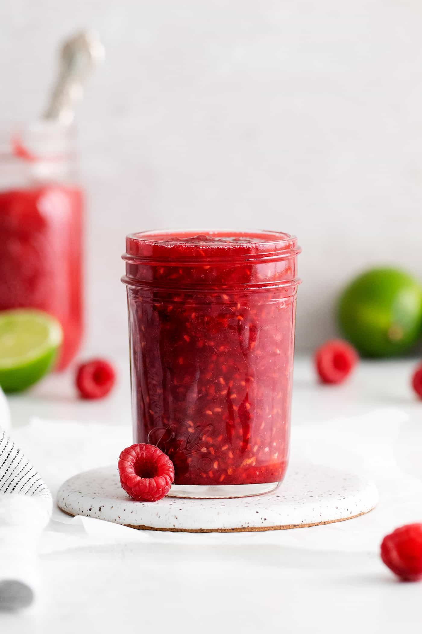 Sweet, bright, and intensely fruity this Raspberry Sauce makes a great topping for angel food cake, cheesecake, ice cream, and more. A jar of raspberry sauce