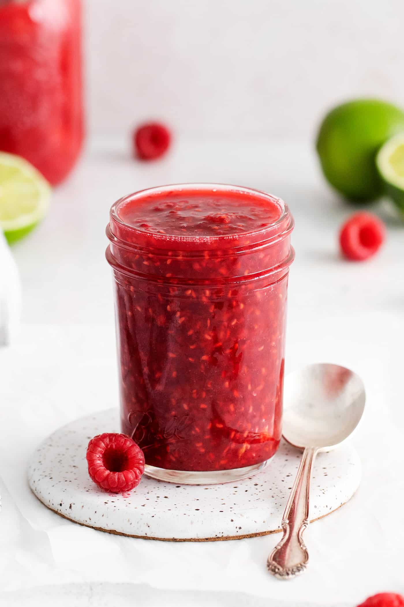 Sweet, bright, and intensely fruity this Raspberry Sauce makes a great topping for angel food cake, cheesecake, ice cream, and more. A jar of raspberry sauce