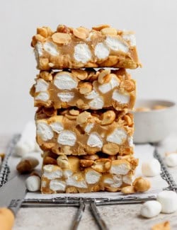 Stack of 4 salted nut roll bars.