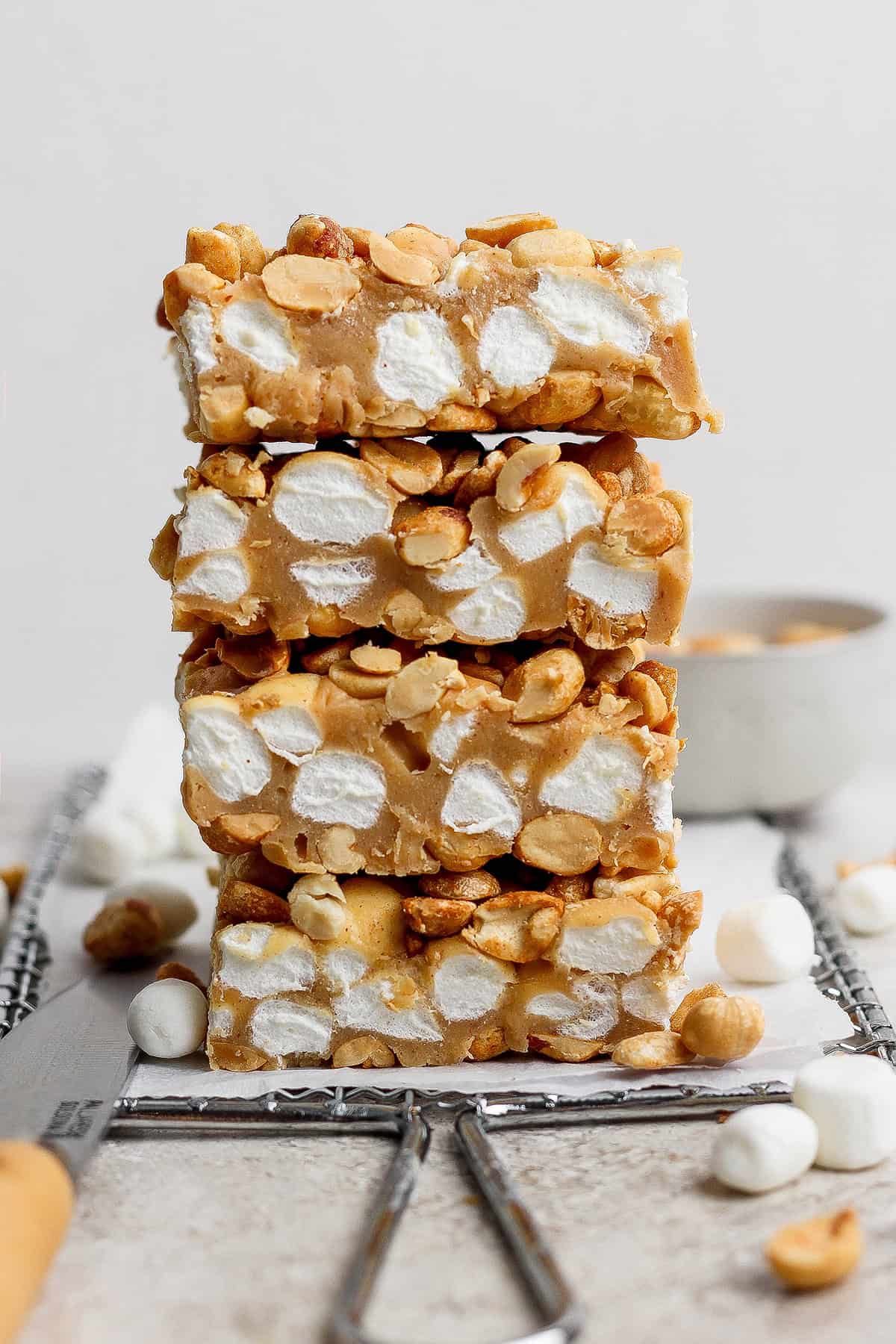 Salted Nut Roll Bars are the perfect salty and sweet combo, an easy riff on the classic candy bar. Just 5 ingredients and 15 minutes of prep! Stack of 4 salted nut roll bars.