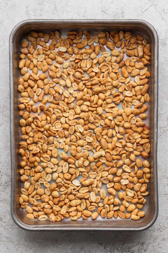 Salted Nut Roll Bars are the perfect salty and sweet combo, an easy riff on the classic candy bar. Just 5 ingredients and 15 minutes of prep! Peanuts spread evenly in pan.