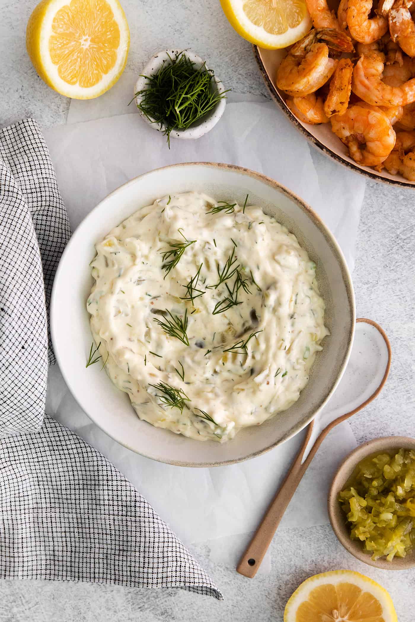 This Homemade Tartar Sauce is the perfect pairing for all your favorite seafood. Delightfully creamy with fresh dill and pickles. Homemade tartar sauce in a bowl