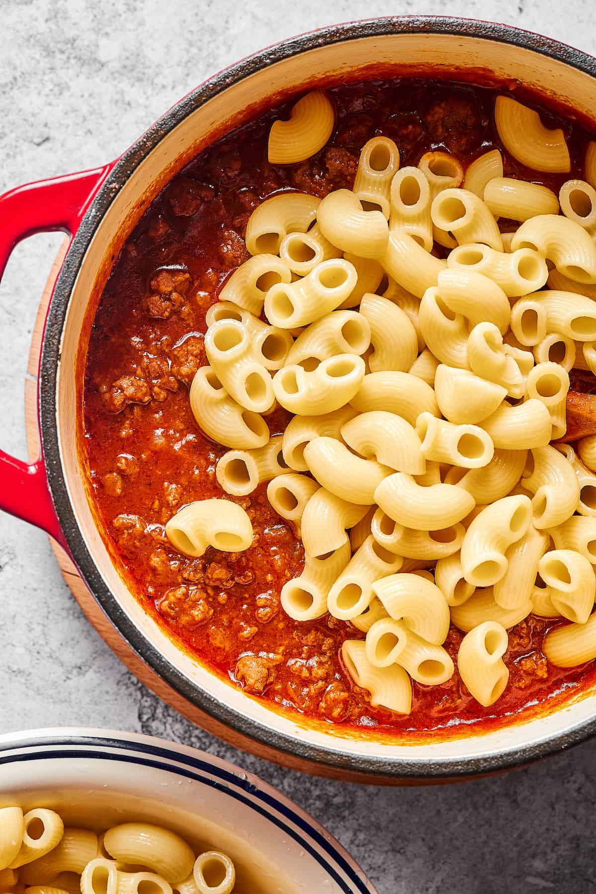 Made with tomato sauce, ground beef, and elbow macaroni, this Easy Beefaroni is the homemade version of the canned classic. Quick & easy! Elbow macaroni added to tomato sauce