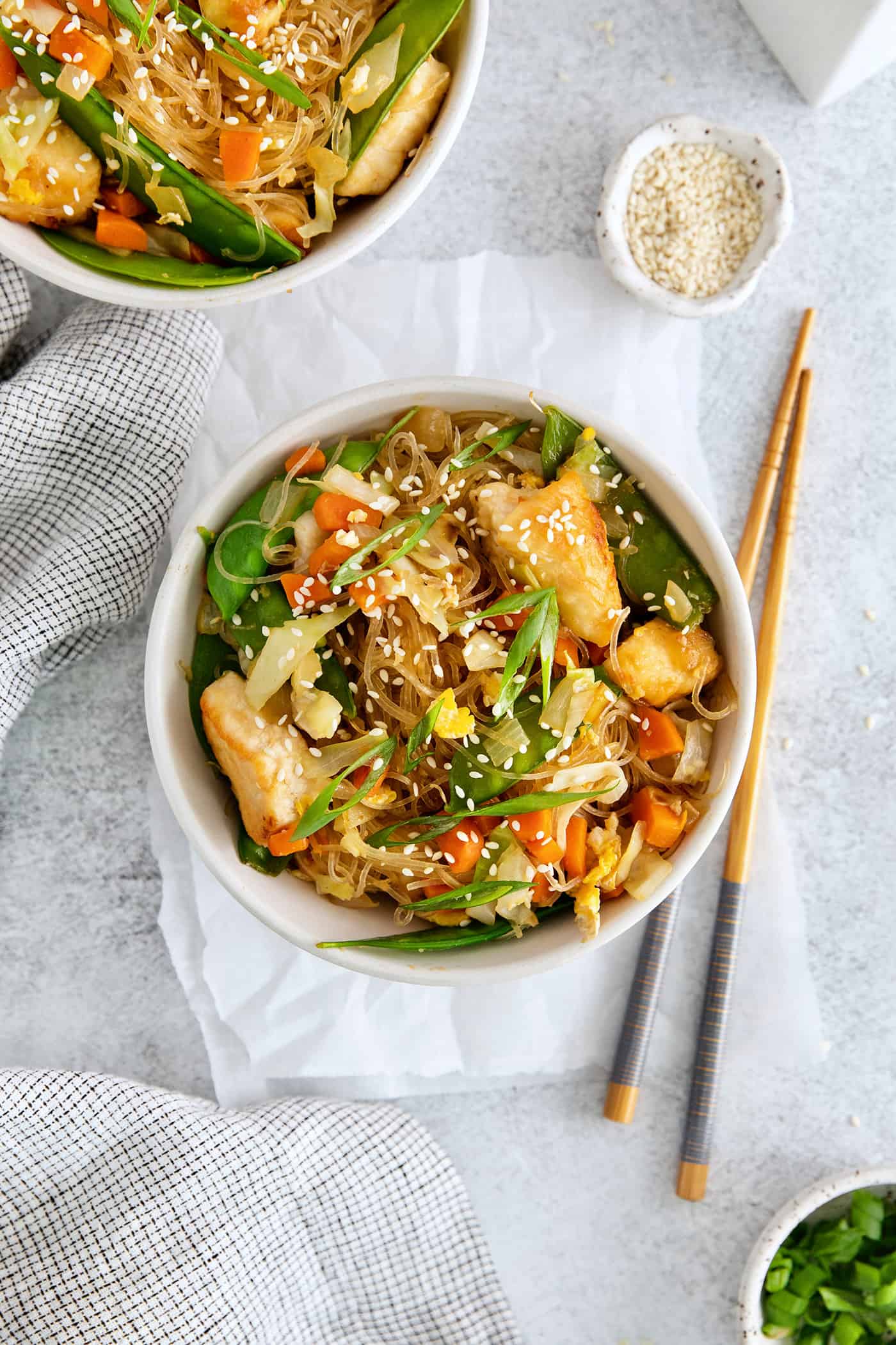 Made with glass noodles, mixed vegetables, and a savory soy glaze, Pad Woon Sen is an easy Thai stir fry that's ready in just 30 minutes! Overhead view of a bowl of Thai glass noodle stir fry