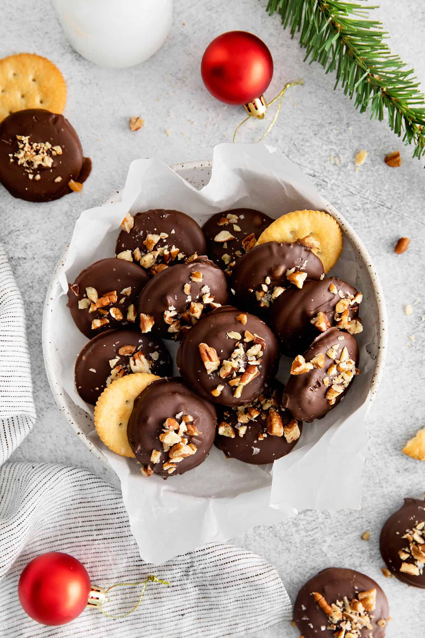 Made with 6 ingredients, Ritz Turtles are a fun, easy treat. These Ritz cracker caramel cookies are sweet, salty, crunchy & chewy all in one. Overhead view of a bowl of Ritz crackers