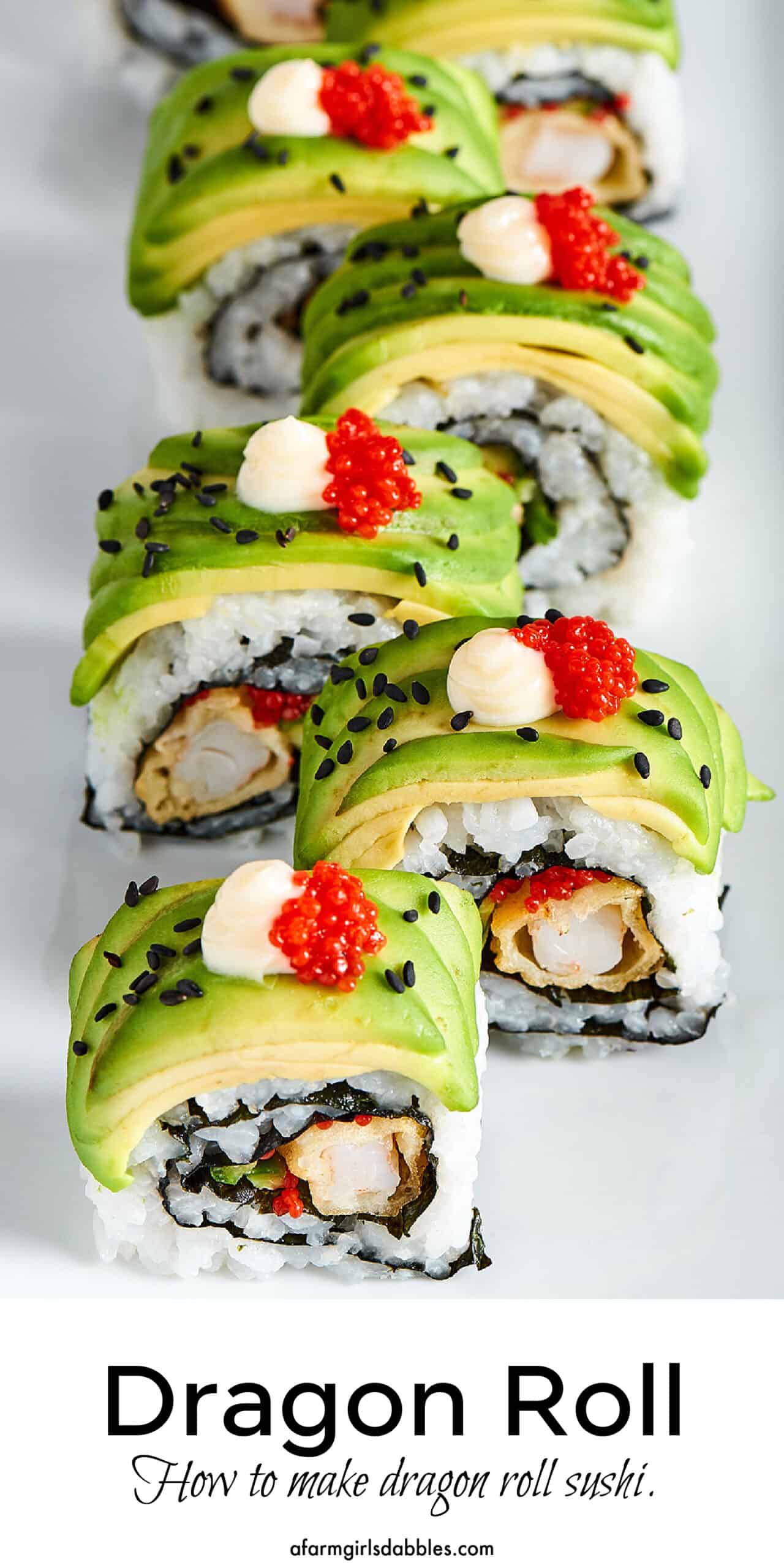 This dragon roll features tempura shrimp, cucumber, tobiko, and avocado wrapped in nori and rice. It's easy to make and such a crowd-pleaser! Pinterest image for dragon roll sushi.