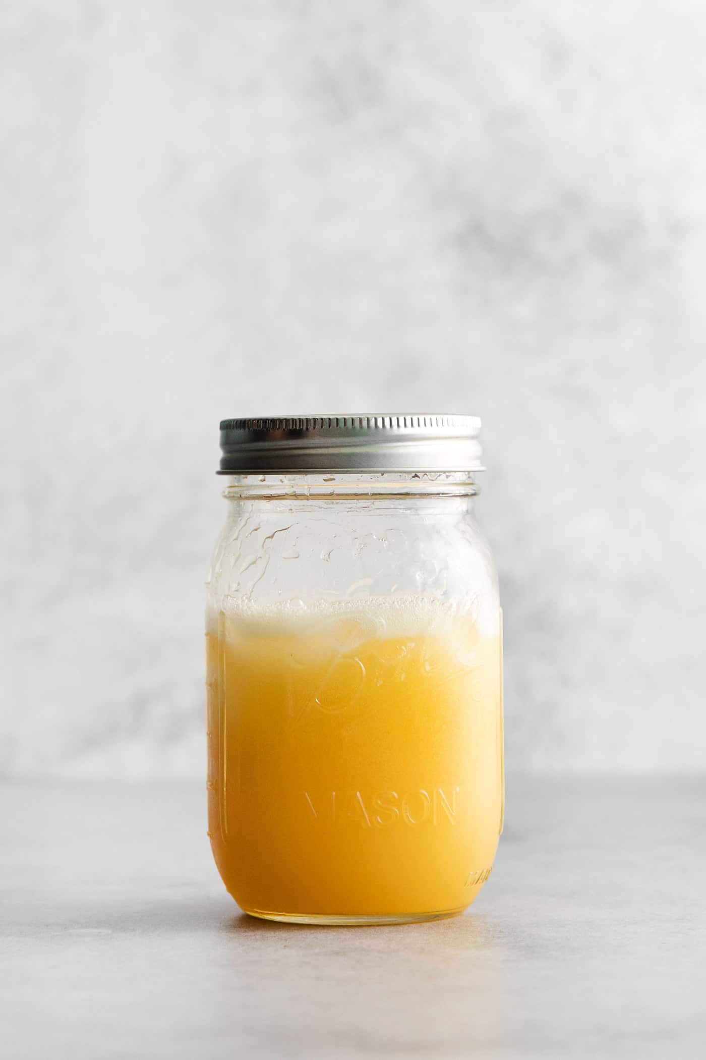 This Bourbon Margarita is a riff on a classic margarita, where bourbon replaces tequila. If you enjoy a whiskey sours, you’ll love this! A mason jar with whiskey margarita ingredients