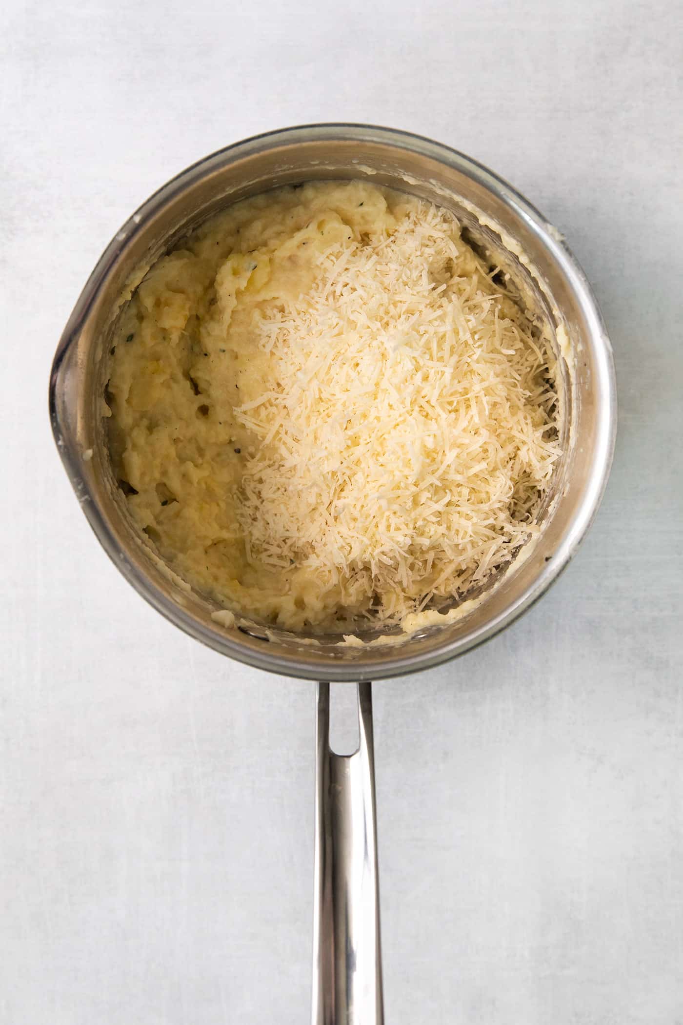 Parsnip Puree is a tasty side dish that is simple enough for every day but impressive enough for the holidays! Mashed parsnips in a saucepan