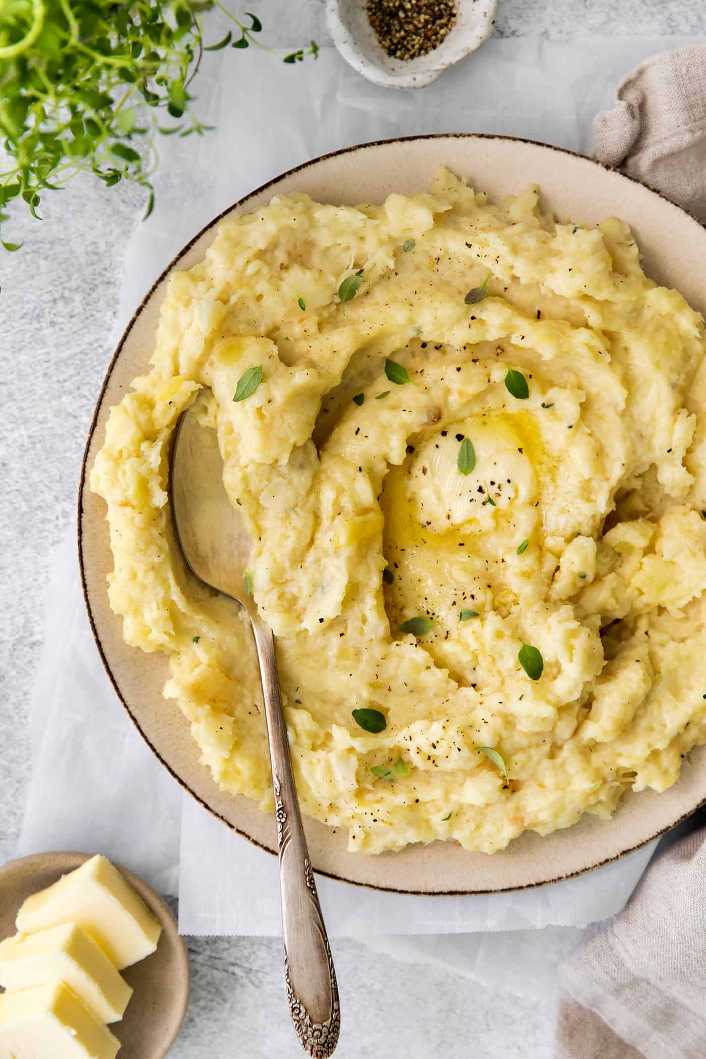 Parsnip Puree is a tasty side dish that is simple enough for every day but impressive enough for the holidays! A plate of parsnip puree with butter