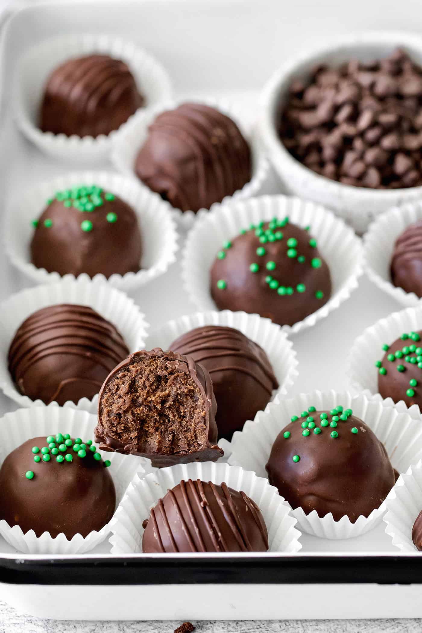Made with your favorite Girl Scout cookies, these Thin Mint Truffles are the perfect combination of rich chocolate and mint flavor. Overhead view of thin mint truffles
