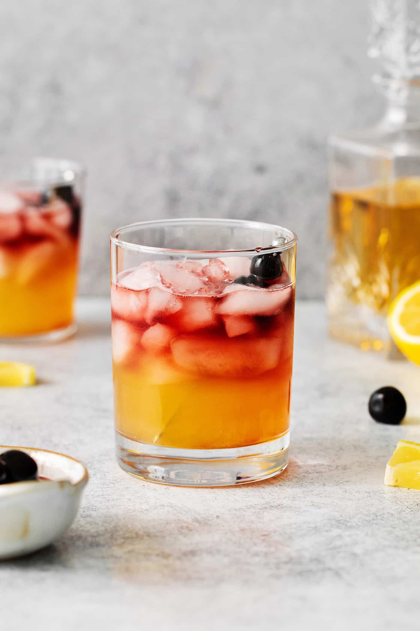This New York Sour is made with whiskey, freshly squeezed lemon juice, simple syrup, and fruity red wine. Perfectly sweet & tart. A New York sour cocktail