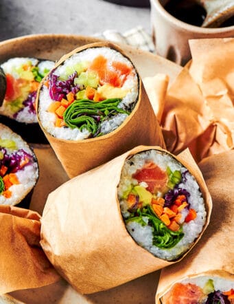 burritos made with sushi ingredients, cut in half