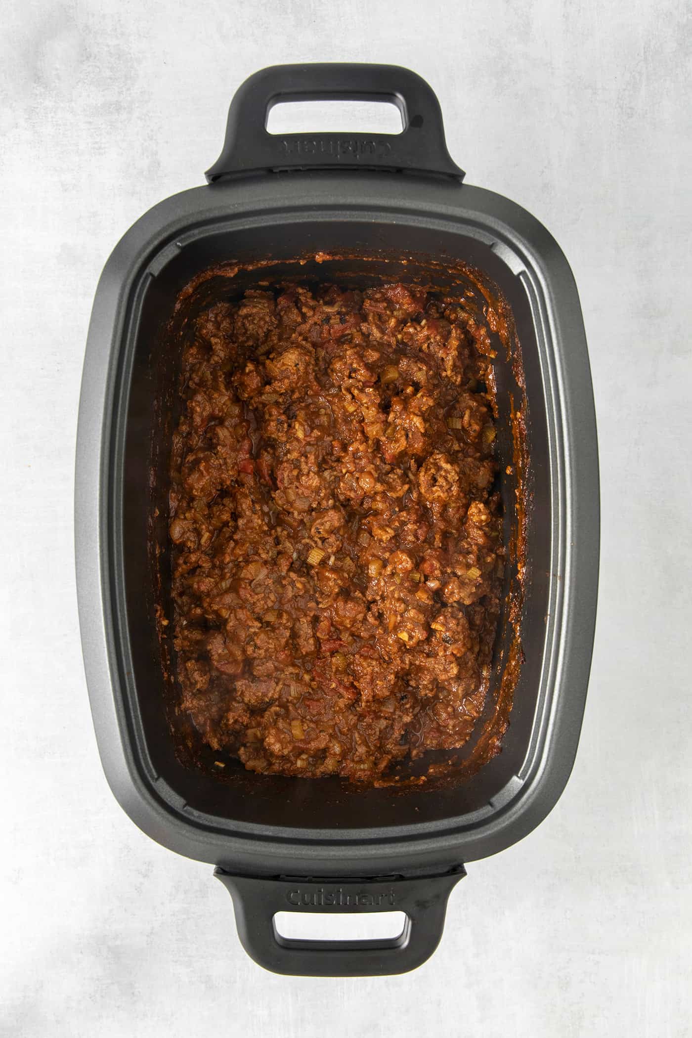 Slow Cooker Sloppy Joes are super flavorful, easy to make, and great for feeding a crowd. Serve on sandwich buns for a quick meal anytime. Sloppy joe meat in the crockpot