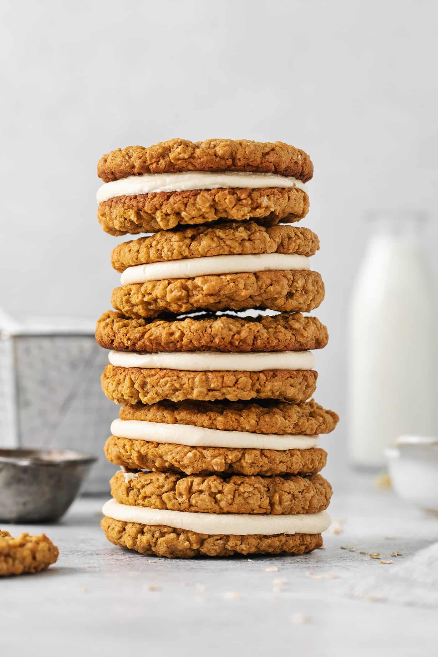 These Oatmeal Cream Pies are just like the classic store-bought variety, where a layer of sweet cream is sandwiched by chewy oatmeal cookies. A stack of oatmeal cream pies