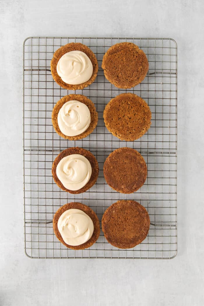 These Oatmeal Cream Pies are just like the classic store-bought variety, where a layer of sweet cream is sandwiched by chewy oatmeal cookies. Oatmeal cookies, half topped with creme filling