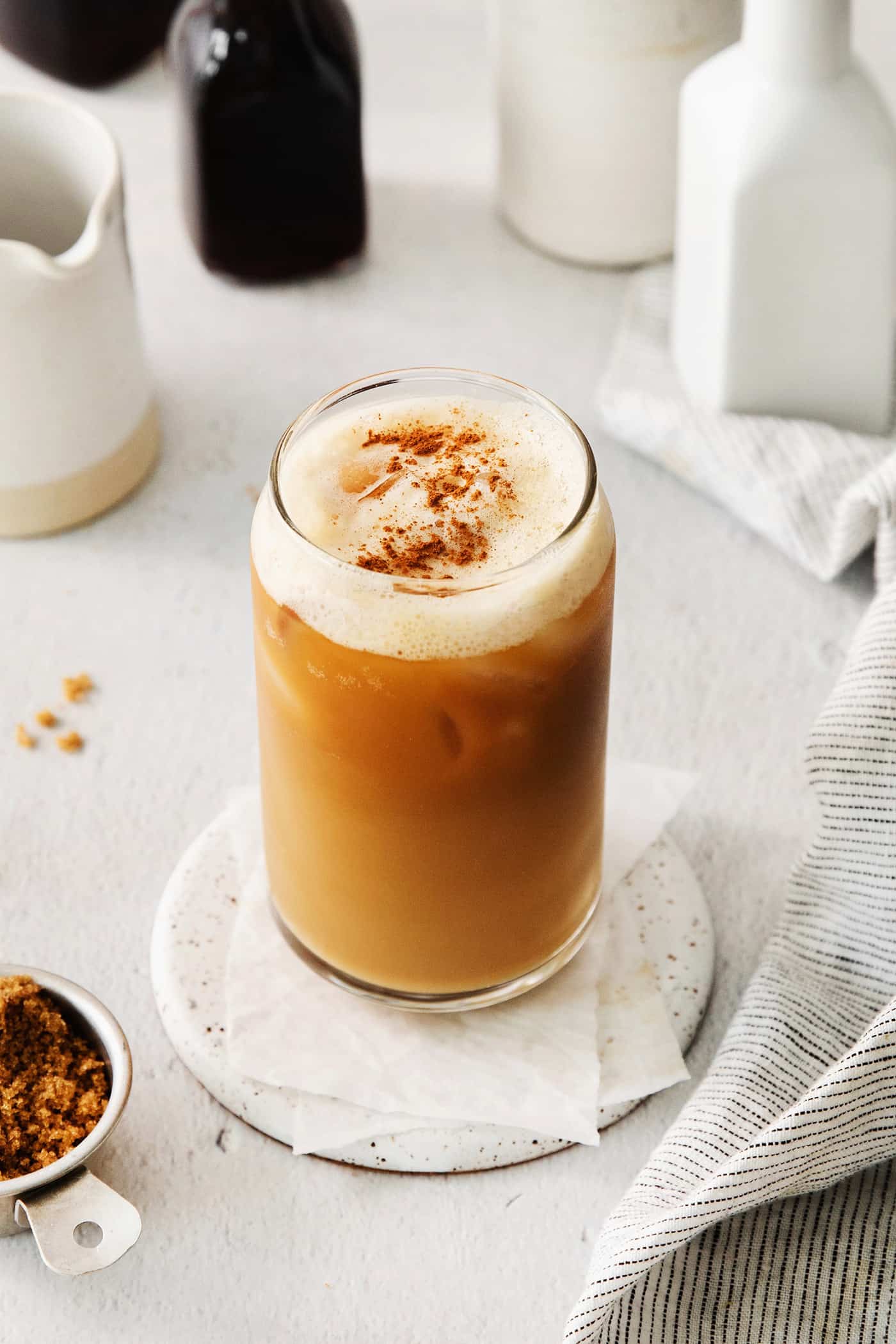 Made with just 4 ingredients, this Iced Brown Sugar Oatmilk Shaken Espresso tastes just like the Starbucks version! Overhead view of a copycat Starbucks brown sugar oatmilk shaken espresso