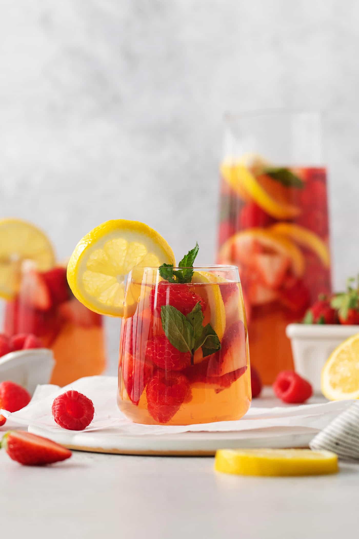 Glasses and a pitcher of sangria are shown.