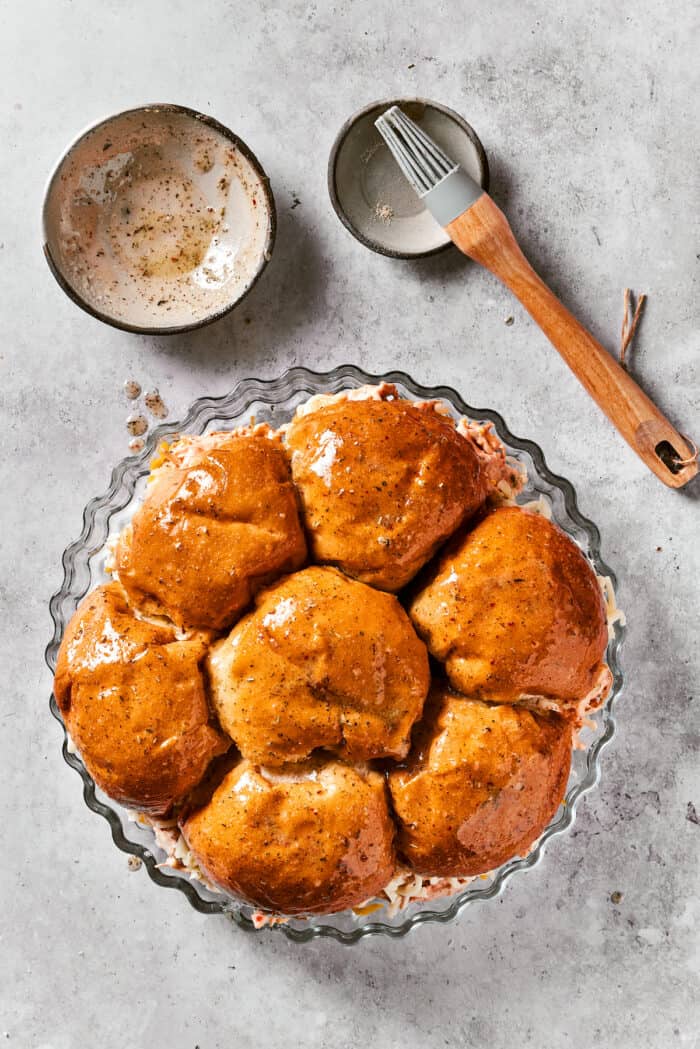 Buffalo Chicken Sliders | Perfect Hand-Held Appetizers Kings hawaiian rolls on a serving dish.