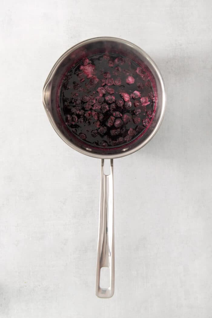 This Blueberry Lemonade is the perfect summertime drink! It’s fruity and refreshing with tart lemons and sweet blueberries. Boiling blueberries and sugar in a saucepan