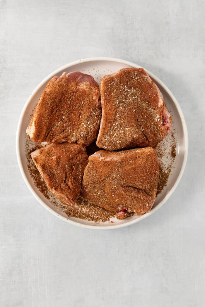 Incredibly tender and a little bit spicy, this easy Pulled Pork recipe is an absolute keeper. It's also super flavorful and versatile. Pork is seasoned.