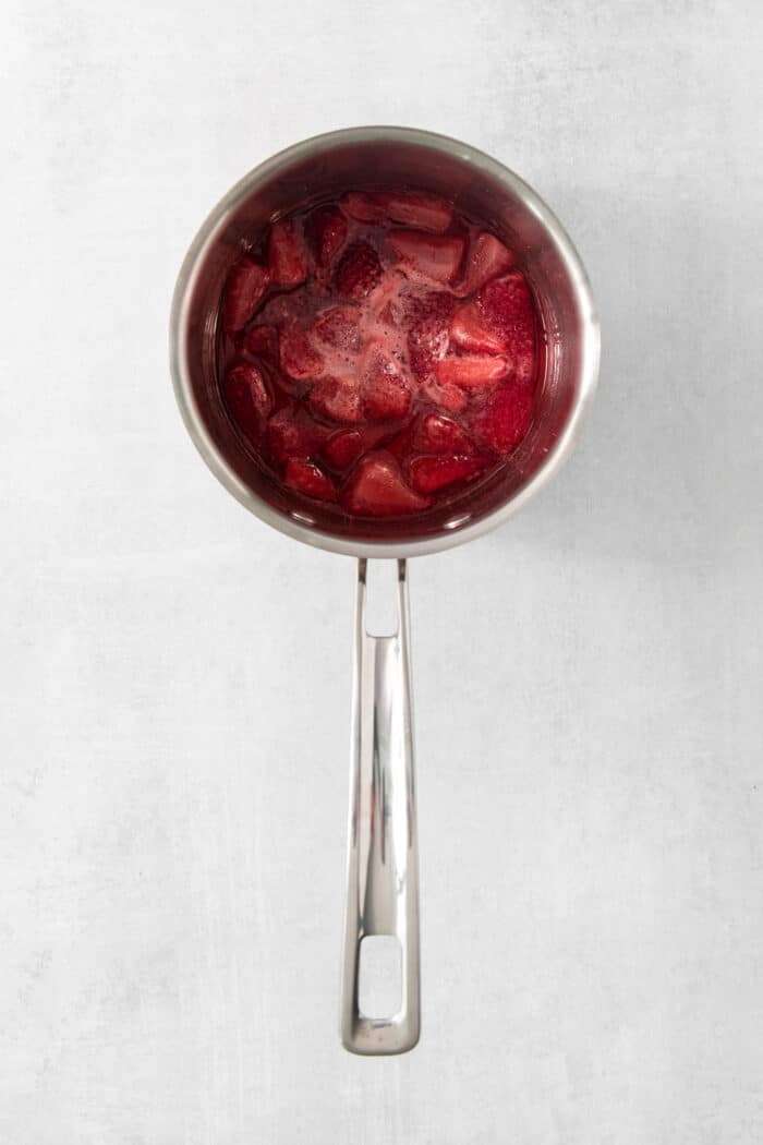 Refreshing and beautiful, Strawberry Milk is beyond simple to make! You'll need just 4 ingredients and a few minutes to whip up glasses of this strawberry-laden drink. Cooking strawberry puree in a pot.