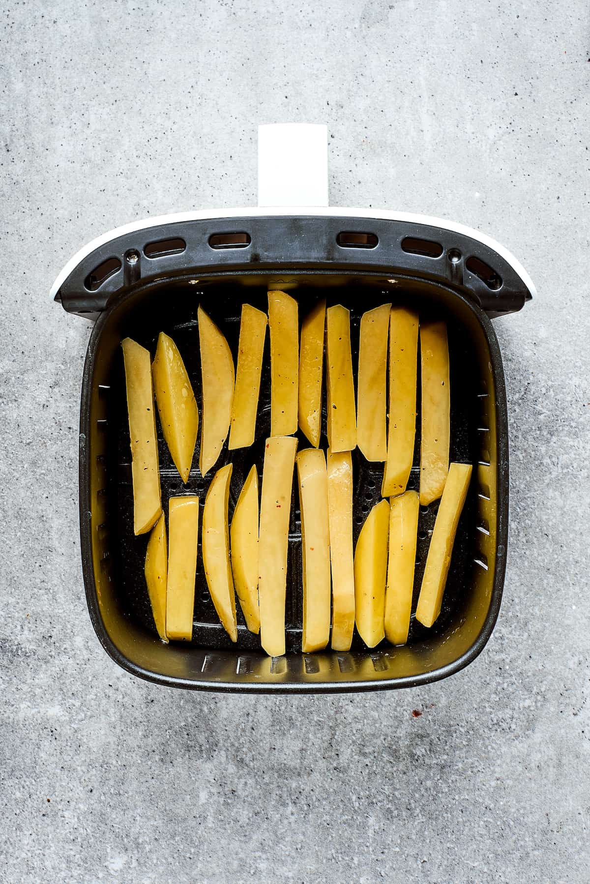 Crispy and flavorful, Truffle Fries may become your new favorite fry! They're touched with truffle salt and a dusting of parmesan cheese. Fries in an air fryer.