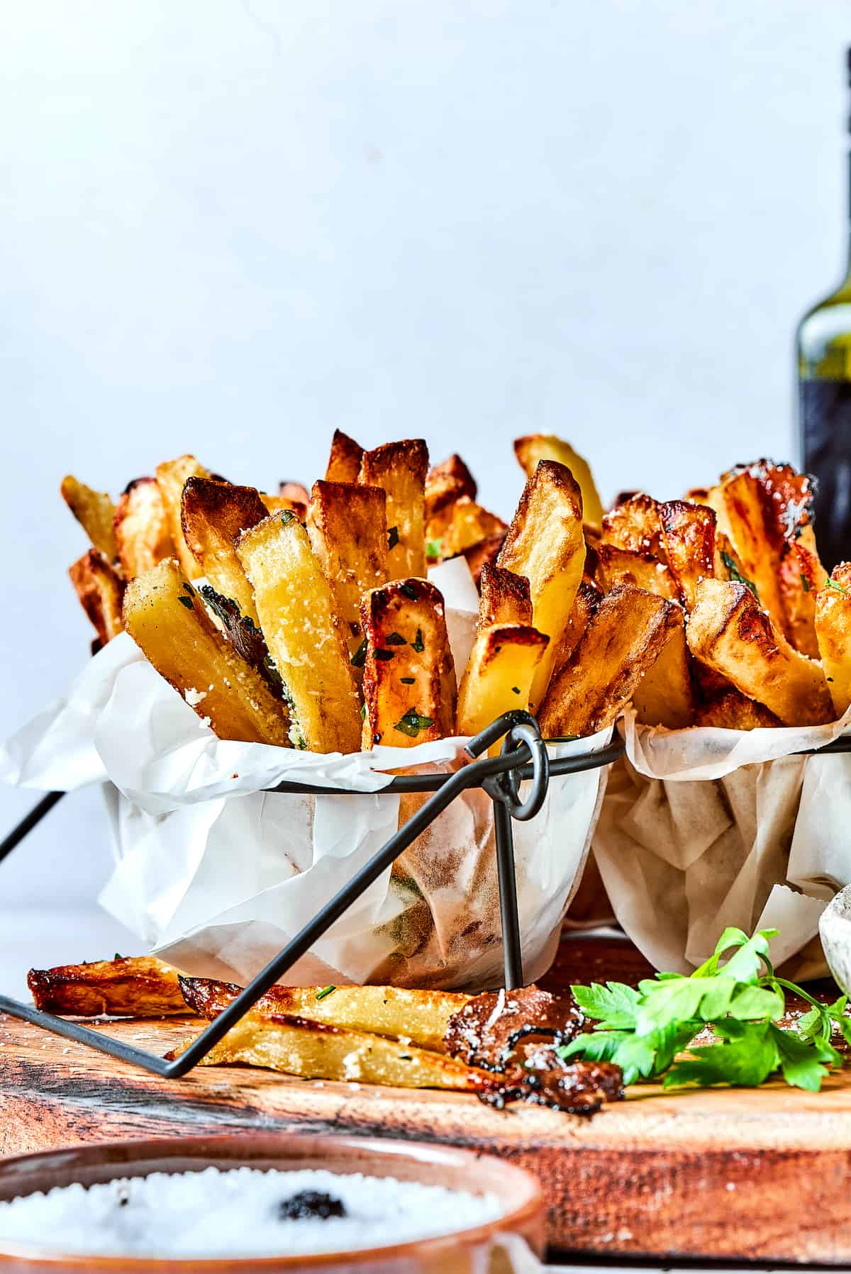 Crispy and flavorful, Truffle Fries may become your new favorite fry! They're touched with truffle salt and a dusting of parmesan cheese. Truffles fries in paper with dip.