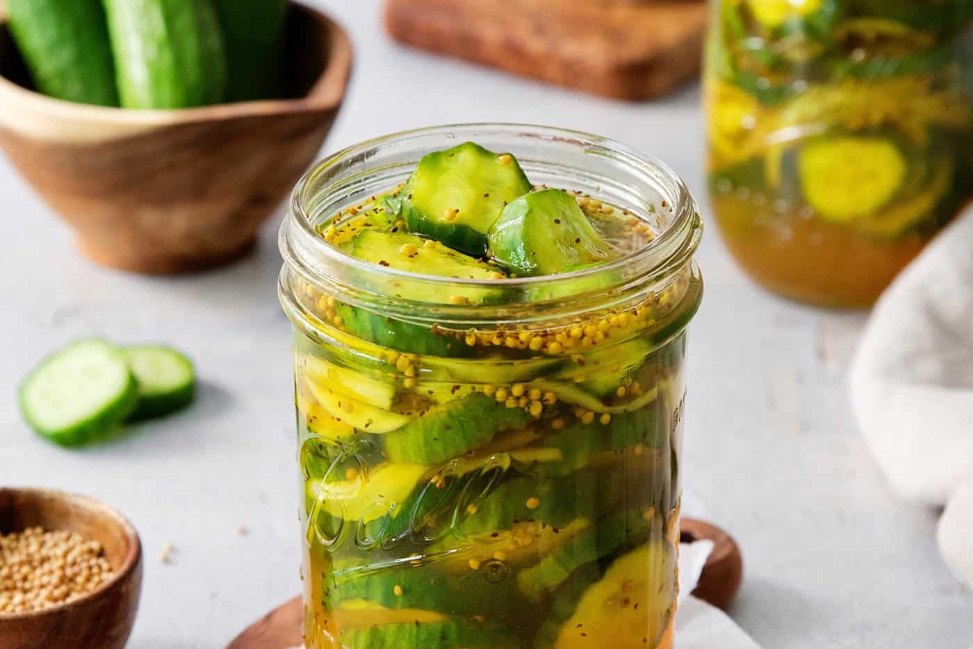 A jar of bread and butter pickles.