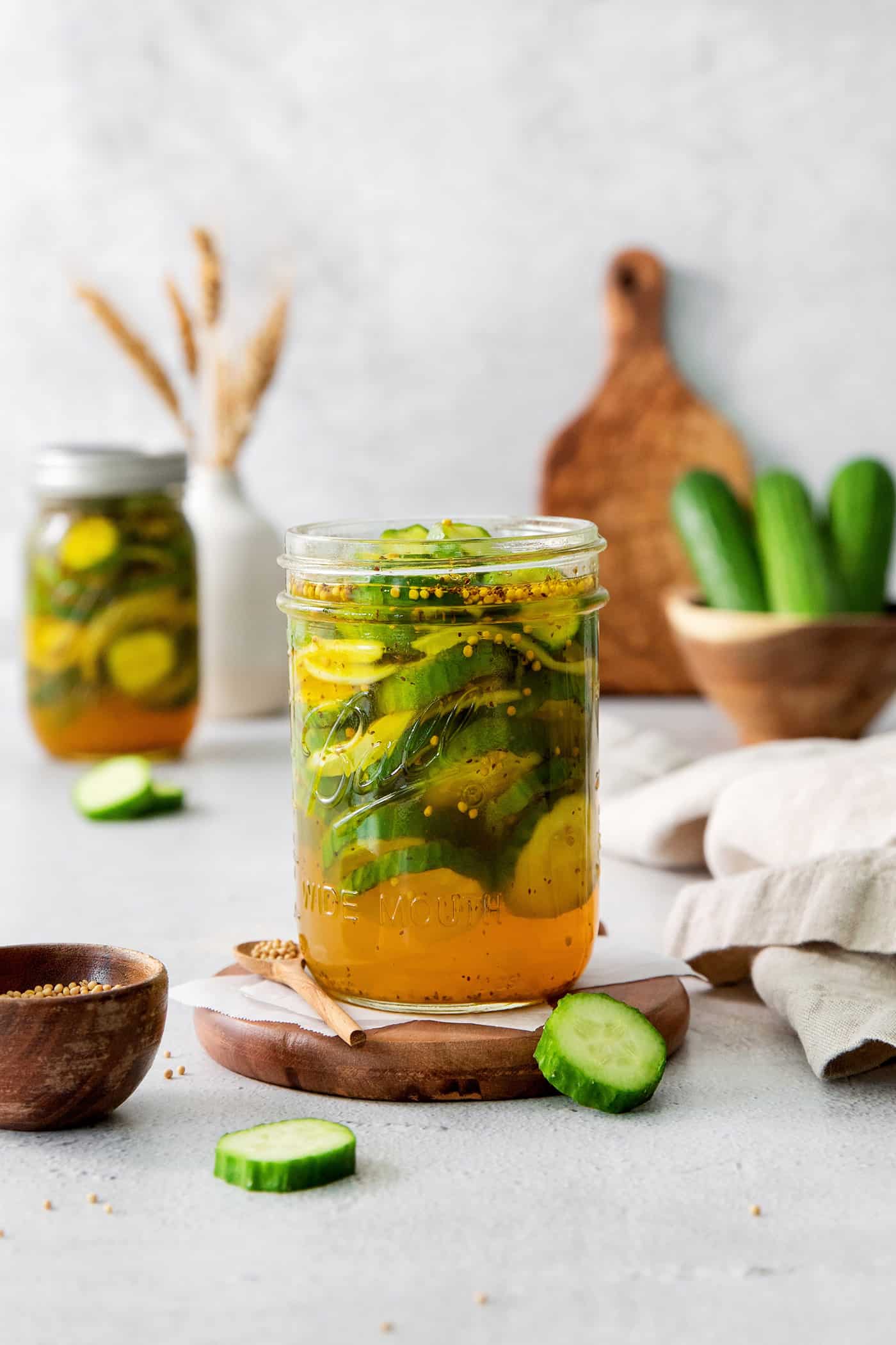 Bread and Butter Pickles are a quick and easy way to make your own pickles. This simple method is packed with flavor and crunch. A jar of bread and butter pickles.